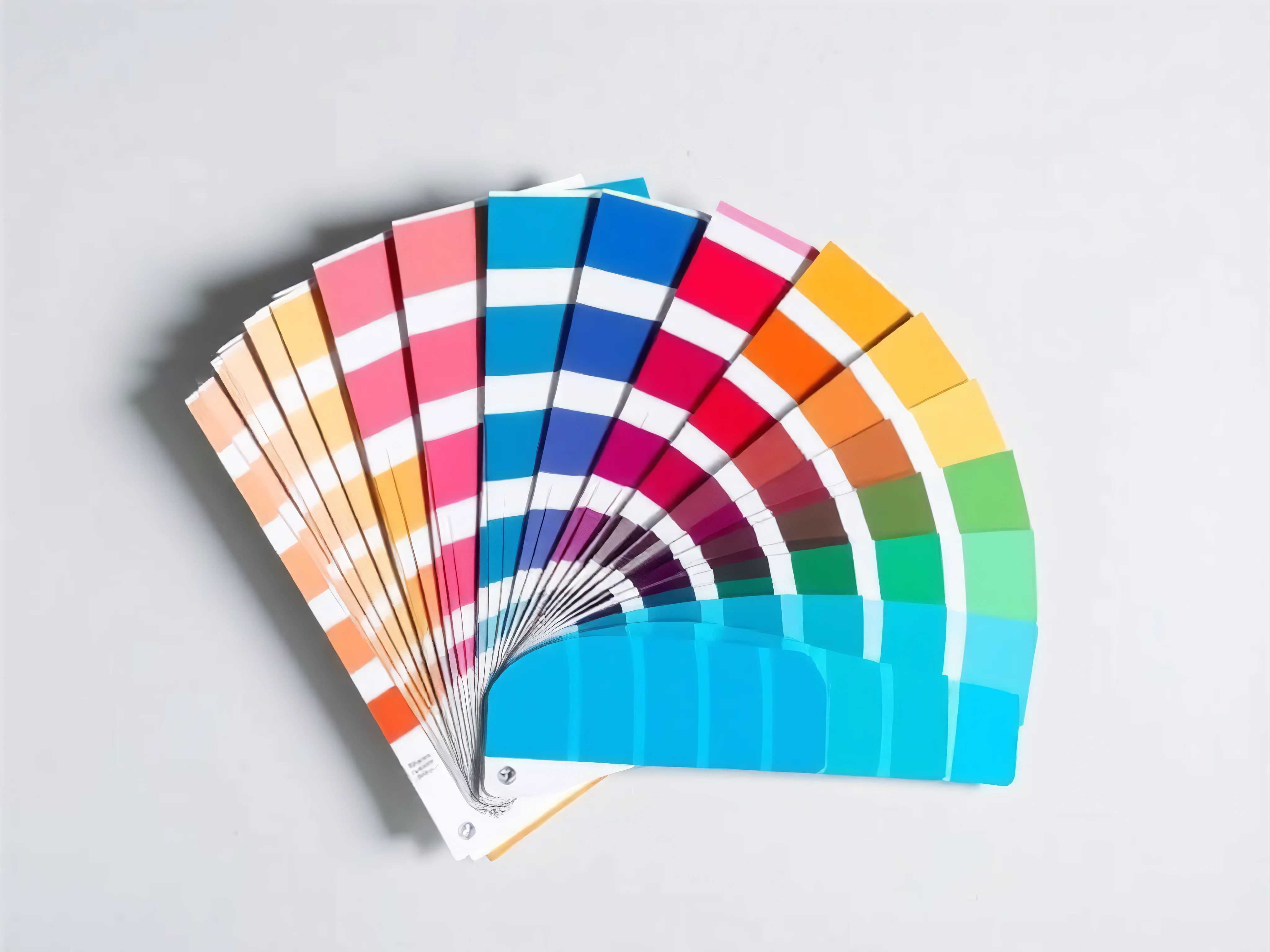 Minimal color wheel swatch fan in vibrant cool jewel tones, flat lay.